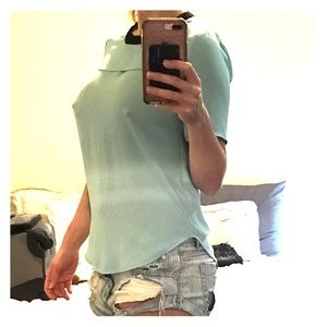 BCBG blue top with back cut out